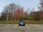 My car parked at John Bryan during the day with the MC-750 vertical whip on the left lip mount. Most of the trees have lost their leaves but a few still have some colors.